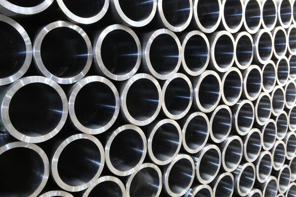 stack of round steel piling