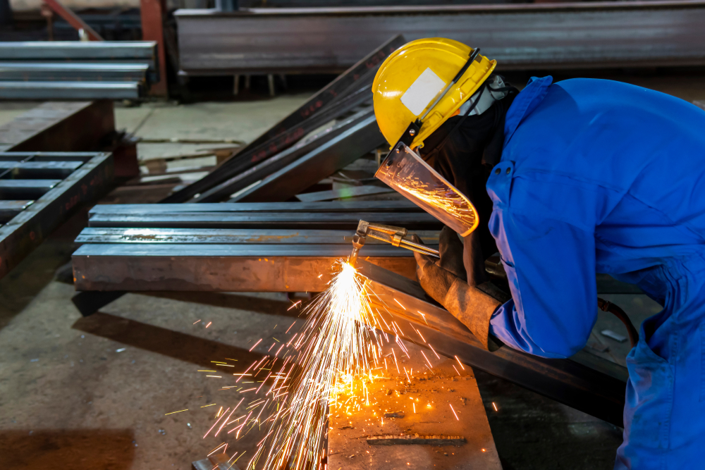 flame cutting a piece of steel