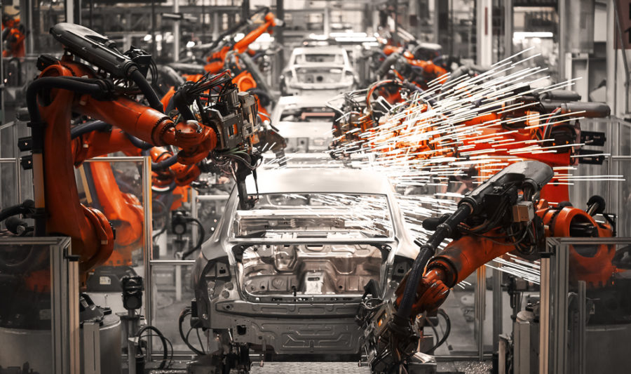 machinery working on a car assembly line