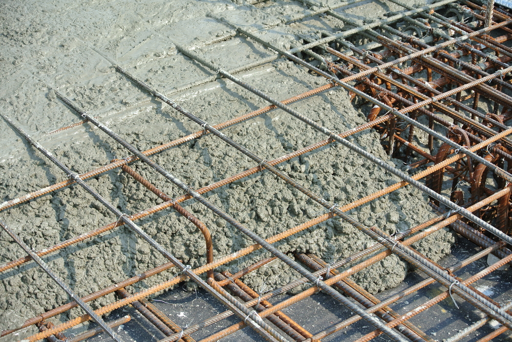 steel rebar in wet cement