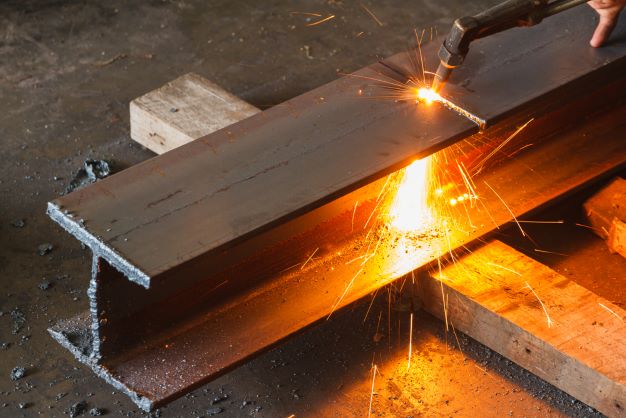 flame cutting a steel beam