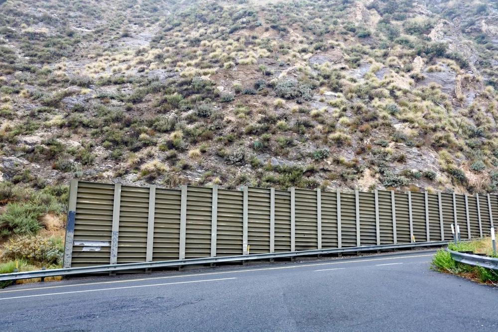 steel retaining wall along hilly terrain