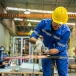 man working in steel service center