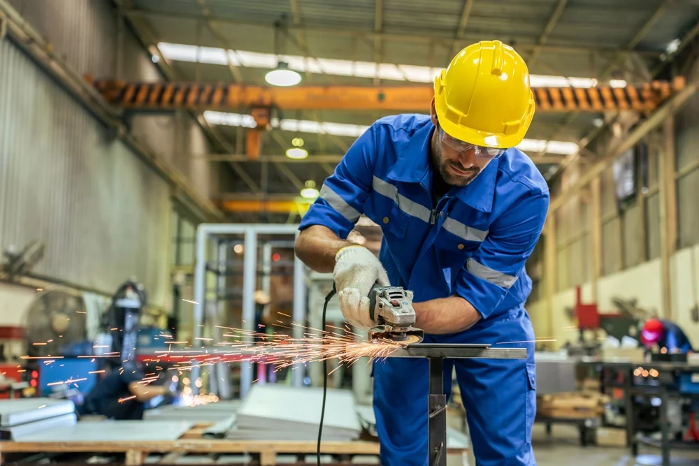 man working in steel service center